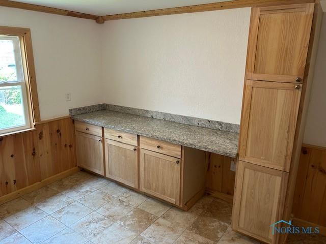 203 S Main, Hicksville, OH 43526 - kitchen featuring wainscoting and wooden walls