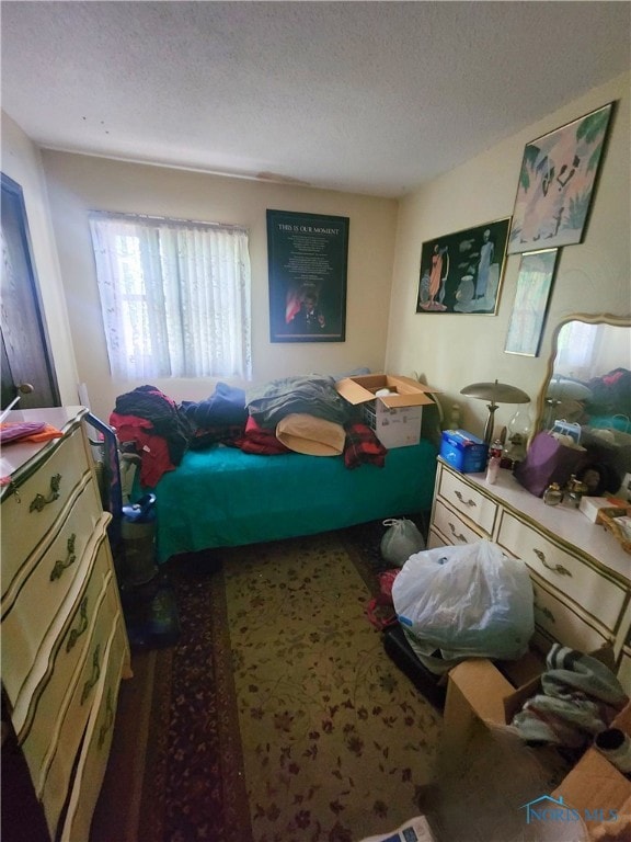 16 Prescott St, Toledo, OH 43620 - carpeted bedroom with a textured ceiling