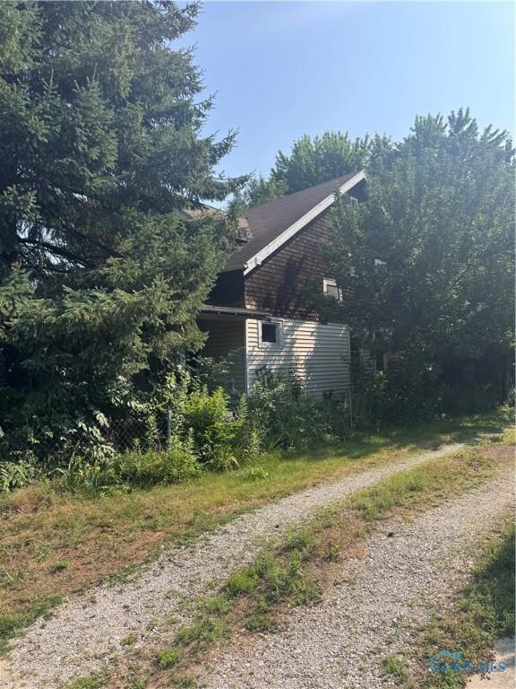1441 Maumee St, Holland, OH 43528 - view of side of property featuring driveway