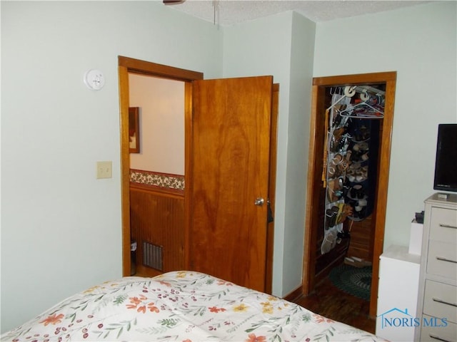 431 Fillmore St, Napoleon, OH 43545 - bedroom with dark wood-type flooring and a closet
