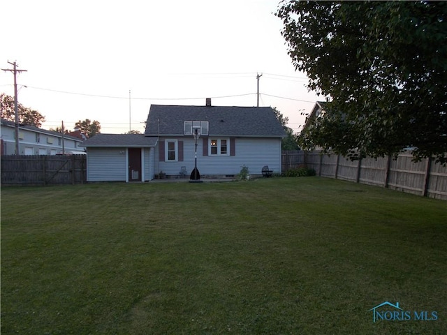 431 Fillmore St, Napoleon, OH 43545 - back of house featuring a fenced backyard