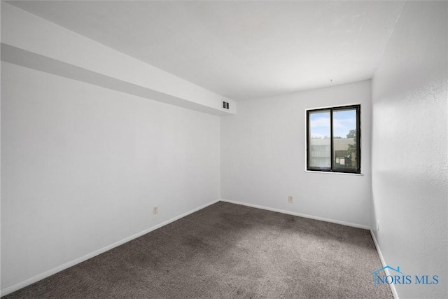6201 Garden Rd Unit A14, Maumee, OH 43537 - empty room with carpet and baseboards