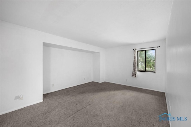 6201 Garden Rd Unit A14, Maumee, OH 43537 - carpeted spare room with baseboards