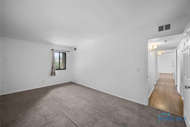 6201 Garden Rd Unit A14, Maumee, OH 43537 - empty room featuring carpet flooring and baseboards