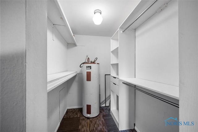 6201 Garden Rd Unit A14, Maumee, OH 43537 - spacious closet with electric water heater and wood finished floors