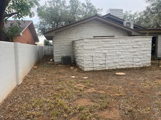 view of outbuilding featuring cooling unit