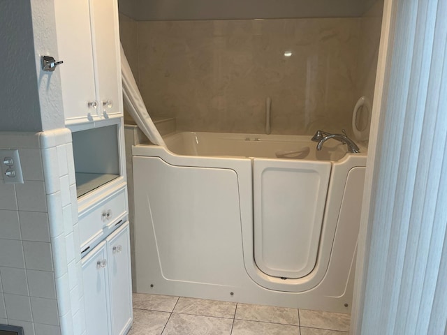 laundry room with light tile patterned floors