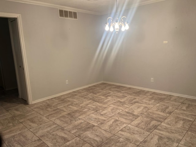 unfurnished room with ornamental molding and a chandelier