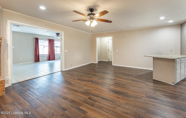3423 60th St, Lubbock, TX 79413 - unfurnished living room featuring ceiling fan, ornamental molding, dark wood-type flooring, and recessed lighting