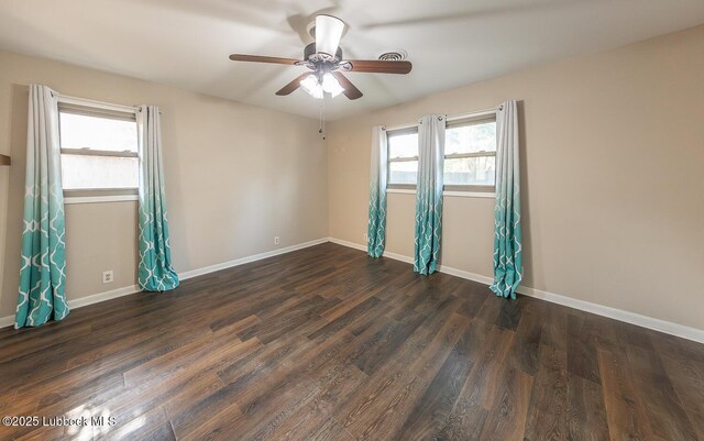 3423 60th St, Lubbock, TX 79413 - unfurnished room with ceiling fan and dark wood finished floors