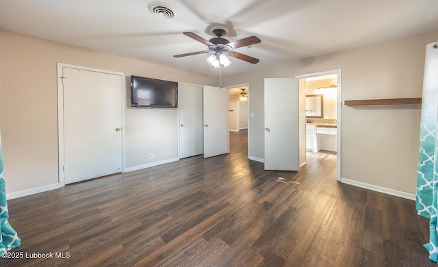 3423 60th St, Lubbock, TX 79413 - unfurnished bedroom with dark wood-style floors and ceiling fan