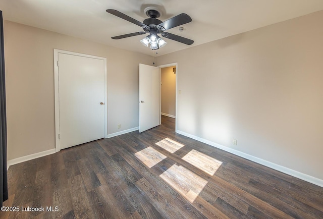 3423 60th St, Lubbock, TX 79413 - unfurnished bedroom featuring dark wood-type flooring and ceiling fan