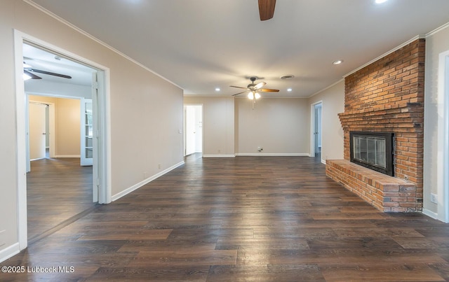 3423 60th St, Lubbock, TX 79413 - unfurnished living room featuring ceiling fan, recessed lighting, ornamental molding, dark wood-type flooring, and a fireplace