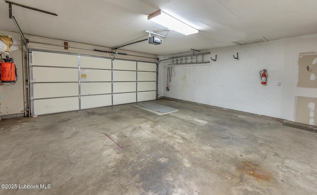 3423 60th St, Lubbock, TX 79413 - garage featuring a garage door opener