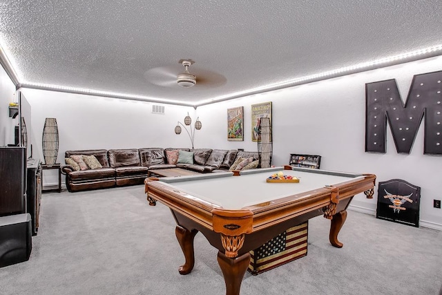 playroom featuring billiards, ceiling fan, light colored carpet, and a textured ceiling