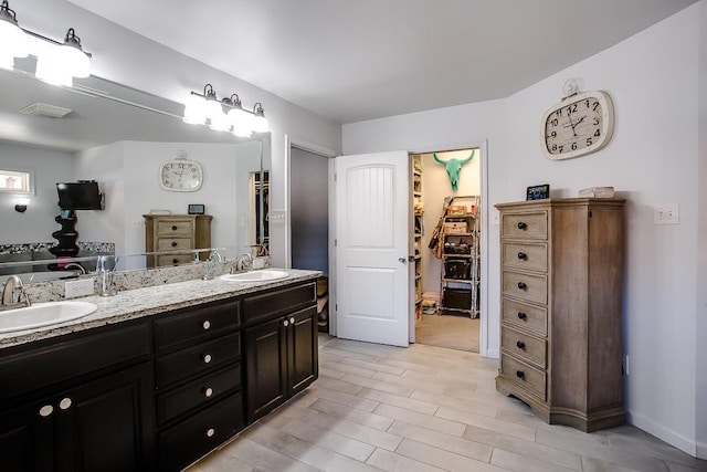 bathroom featuring vanity and hardwood / wood-style floors