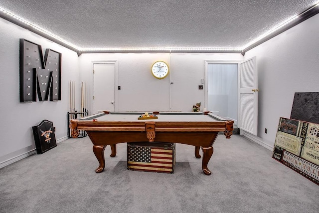 rec room with carpet floors, a textured ceiling, and billiards