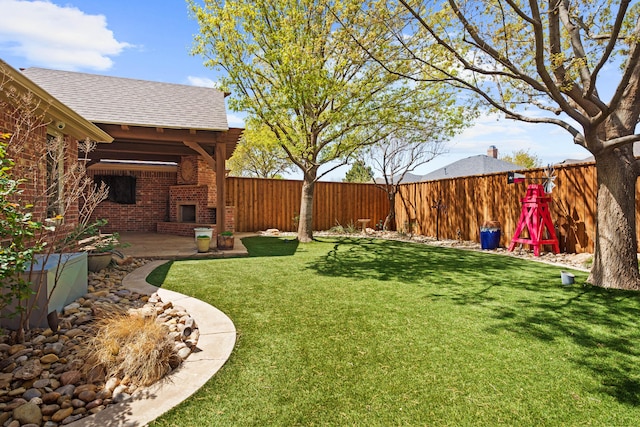 view of yard with a fenced backyard