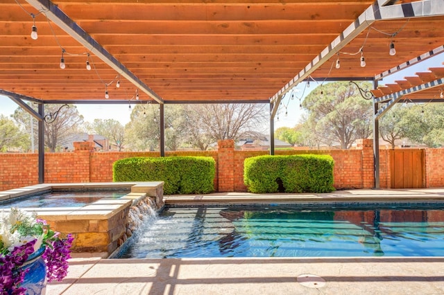 view of swimming pool featuring an in ground hot tub, pool water feature, and a pergola