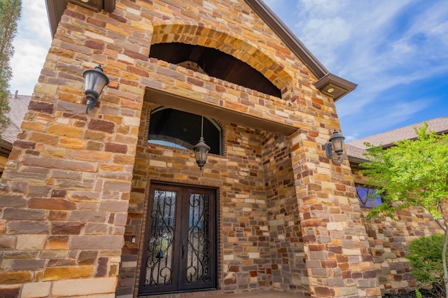 doorway to property featuring french doors