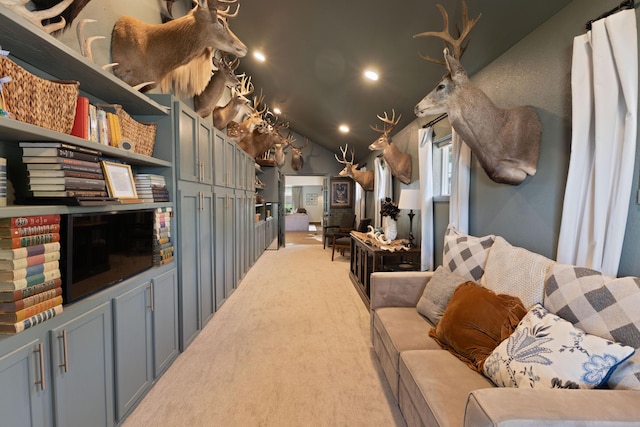 6109 Elkhart Ave, Lubbock, TX 79424 - living area with light colored carpet, vaulted ceiling, and recessed lighting