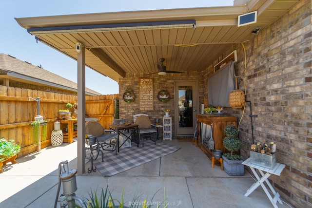 view of patio / terrace featuring ceiling fan