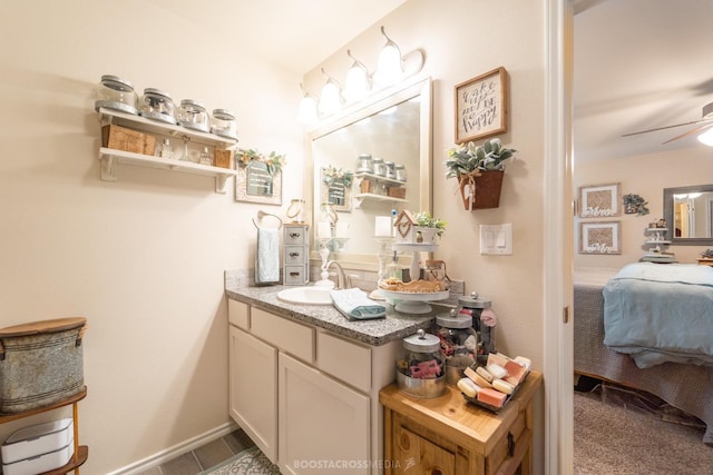 bathroom featuring vanity and ceiling fan