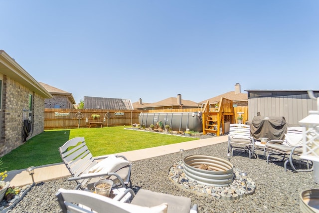 view of yard with a patio area