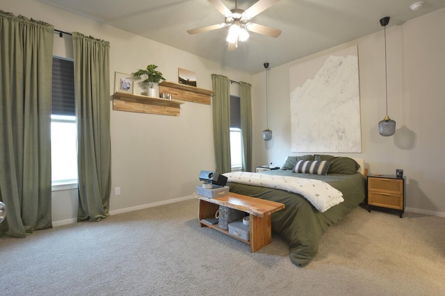 bedroom with light colored carpet and ceiling fan