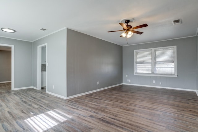 empty room with crown molding, ceiling fan, and wood-type flooring