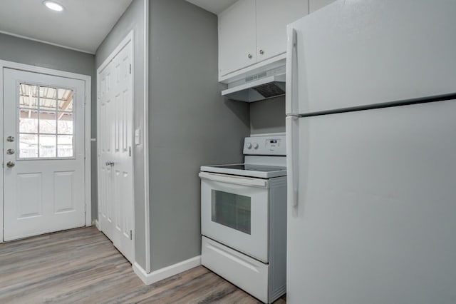 kitchen featuring white cabinetry, white appliances, and light wood-type flooring