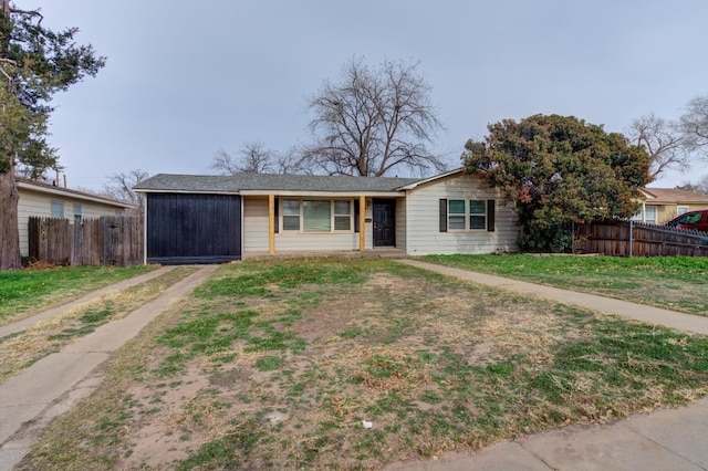 single story home featuring a front yard