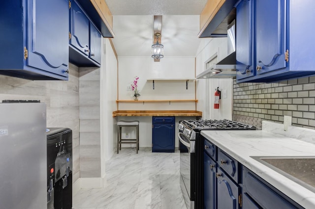 kitchen with backsplash, blue cabinetry, and appliances with stainless steel finishes