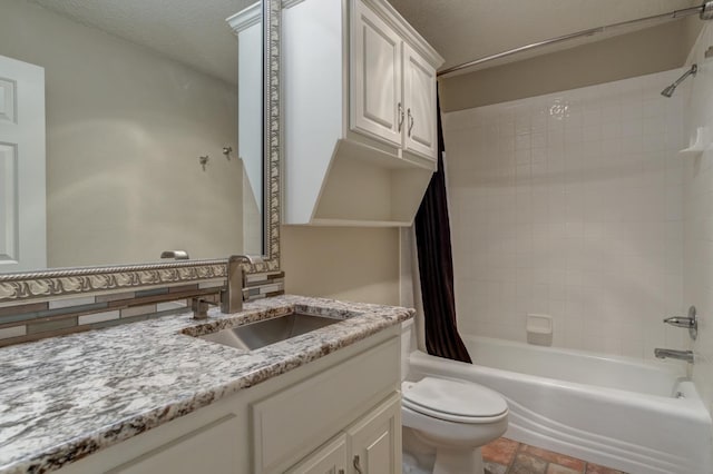 full bathroom featuring toilet, tasteful backsplash, a textured ceiling, vanity, and shower / bathtub combination with curtain