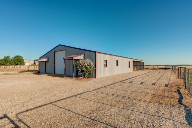 exterior space featuring an outdoor structure