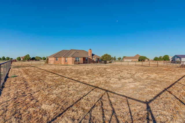 view of yard featuring a rural view