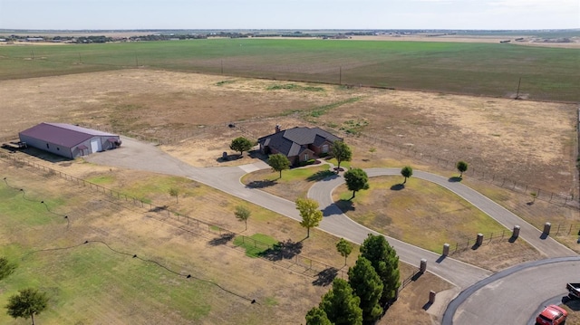 birds eye view of property featuring a rural view