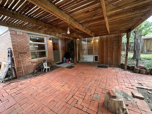 view of patio featuring a pergola