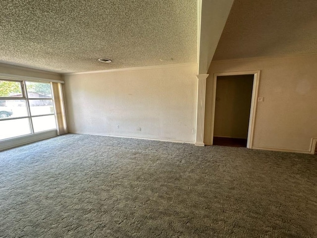 empty room featuring ornamental molding, a textured ceiling, and carpet flooring