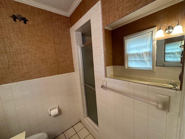 bathroom featuring crown molding, tile walls, tile patterned flooring, a textured ceiling, and walk in shower