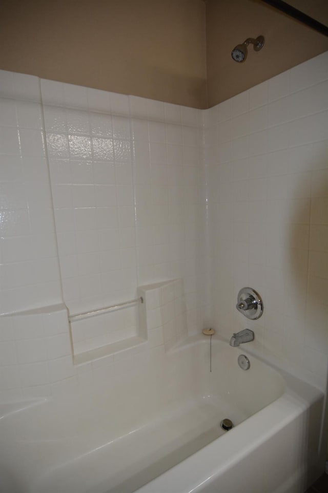 bathroom with shower / tub combination