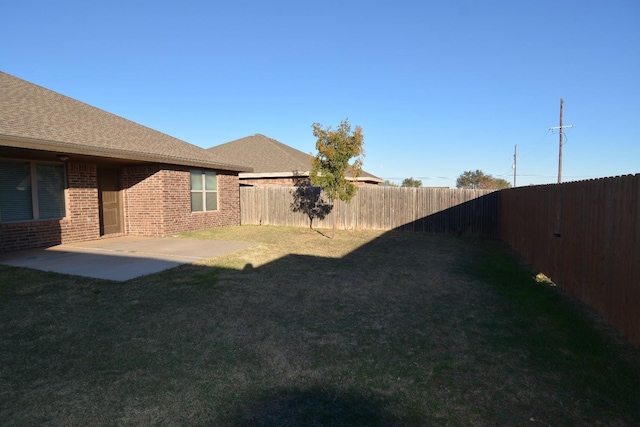 view of yard with a patio area