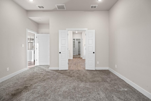 unfurnished bedroom featuring carpet floors