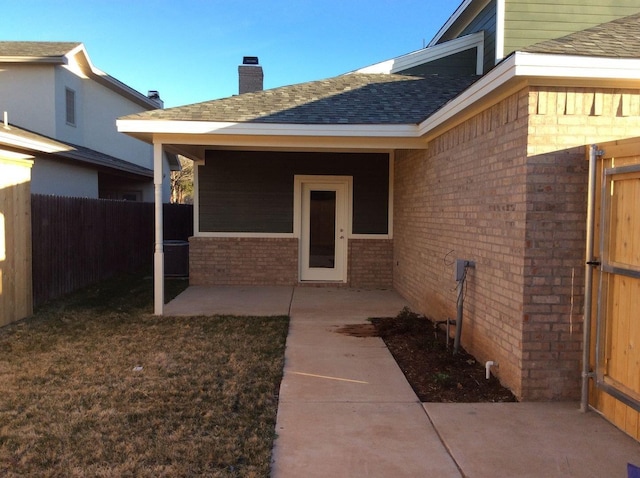 doorway to property with a patio area