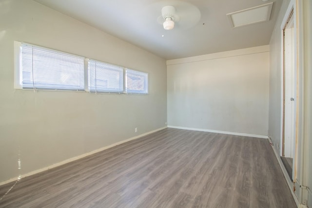 spare room featuring hardwood / wood-style flooring