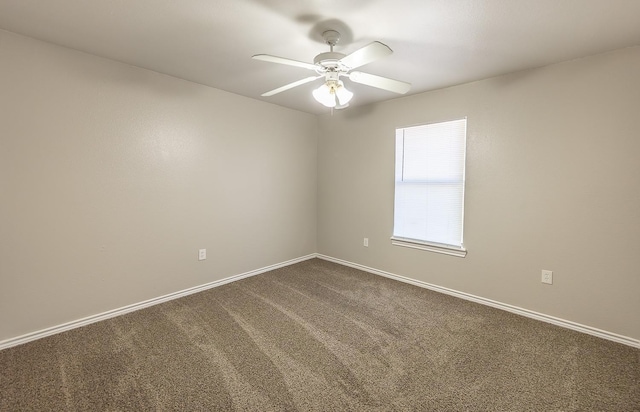 empty room with carpet floors and ceiling fan