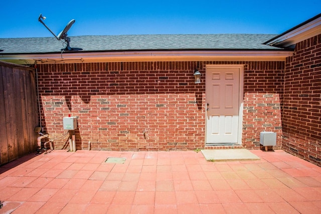 entrance to property with a patio