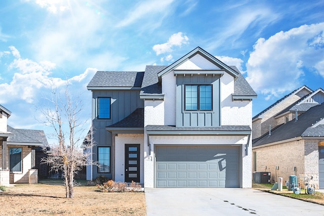 modern inspired farmhouse featuring brick siding, board and batten siding, a shingled roof, driveway, and an attached garage