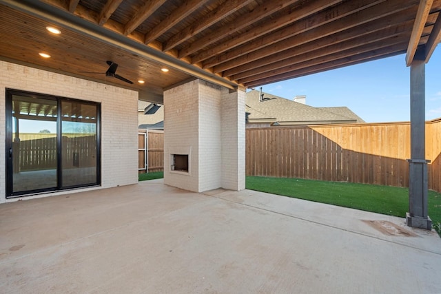 view of patio / terrace featuring fence