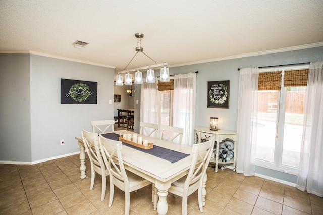 7802 Zoar Ave, Lubbock, TX 79424 - dining space featuring healthy amount of natural light, light tile patterned floors, and ornamental molding